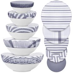 a stack of bowls and plates with different patterns on the top one is blue and white