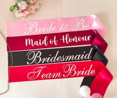 the bride and groom sashes are on display