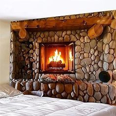 a bedroom with a bed and a fireplace in the wall next to an open fire place