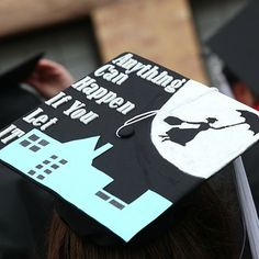 a graduate's cap has been decorated with an image of a woman