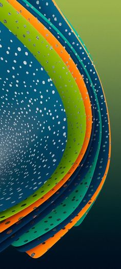 an abstract image of blue, green, orange and white circles with drops of water on them