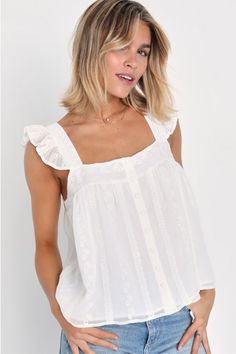 Make all your sunny afternoons a little more adorable with the Lulus Angelic Sweetie White Ruffled Embroidered Button-Front Top! Lightweight woven fabric shapes this adorable top that has eyelet embroidery throughout and wide tank straps with ruffled details. Airy bodice has a full button placket at front and a relaxed fit. Fit: This garment fits true to size. Length: Size medium measures 22.5" from shoulder to hem. Bust: Great for any cup size. Waist: Not Fitted - comfortable room throughout mi Lacey White Top, White Frilly Tank Top, Cute White Tops Summer, White Tops For Women Simple, White Flowy Beach Top, Cute Simple Tops, Cute Tops For School, White Cute Top, Pink Summer Top