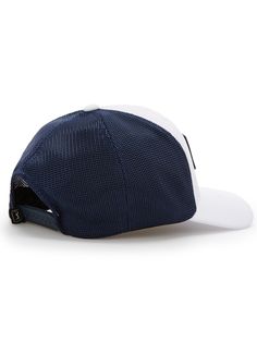 a blue and white hat with a black patch on the front, one side is shown