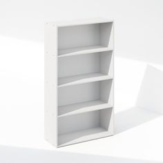 an empty white book shelf on a plain surface