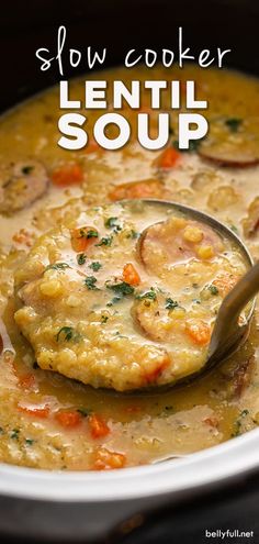 a close up of a bowl of soup with a spoon in it and the text slow cooker lentil soup