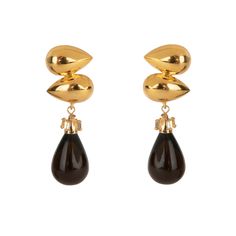 Crafted from semi-precious stones, the Lili Earrings offer a versatile style with a removable drop, allowing for a transition to a more minimalist look. Their design seamlessly fuses vintage and art deco influences. Modern Formal Briolette Earrings, Modern Briolette Earrings For Formal Occasions, Timeless Gemstone Earrings For Formal Occasions, Chic Evening Clip-on Earrings, Timeless Evening Earrings With Gemstone, Timeless Gemstone Earrings For Evening, Luxury Teardrop Diamond Earrings, Luxury Gemstone Clip-on Earrings For Formal Events, Luxury Gemstone Clip-on Earrings For Formal Occasions