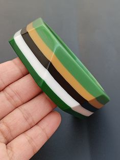 you will receive 1 piece of  Resin bracelet, bangle supplies Bangle inner diameter Size = 2.6" approx.                       Bangle Width = 1" Material: Resin Quantity: 1 Piece Thank you very much for visiting! Any questions, please feel free to contact us. Discount for bulk provide. Handmade Retro Bangle For Gifts, Handmade Retro Bangle Bracelet, Retro Green Bangle Bracelets, Multicolor Retro Bracelet For Gift, Green Retro Bracelet As A Gift, Multicolor Retro Bracelets For Gift, Retro Green Bracelet For Gift, Multicolor Retro Bracelet As Gift, Retro Multicolor Bracelets For Gift