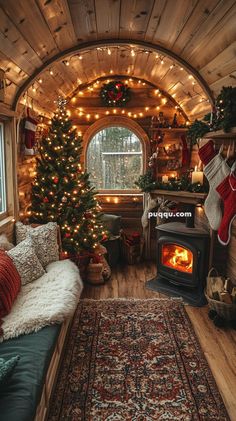 a living room filled with furniture and a fire place next to a window covered in christmas stockings