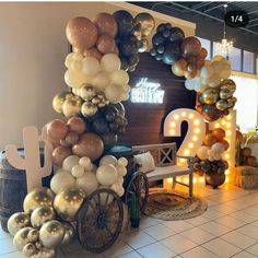 balloons and lights decorate the entrance to a birthday party