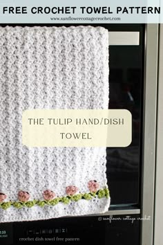 a crochet towel hanging on the side of a microwave oven with text overlay that reads, the tulip hand / dish towel