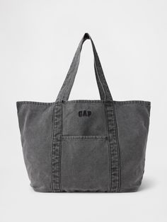 Soft, overdyed cotton tote bag.  Shoulder straps.  Outer and inner patch pockets.  Embroidered mini Gap arch logo at front.  Assorted colors.  This product was made in a factory that invests in gender equality and women’s empowerment.  Through RISE Reimagining Industry to Support Equality) and Gap Inc. ’s program P. A. C. E.  Personal Advancement & Career Enhancement), we support people who make our clothes to build the skills, knowledge, confidence, and resilience needed to advance in work and Bible Study Tote Bag, Jersey Mikes, Slouchy Tote Bag, Tote Bag For School, 19th Bday, Tote Bag With Zipper, Slouchy Tote, Logo Tote Bag, Gym Tote