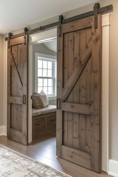 an open sliding barn door in a bedroom