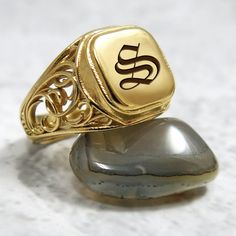 The initial signet ring is a classic piece of jewelry for both men and women. Bring a little bling with this unique square-shaped initial signet ring in 24k gold plated brass with your choice of initial letters made especially for you. #jonjonjewel #signetring #sealring #initialring #letterring #Monogramring #ManSignetRing #PersonalizedRing Antique Initial Ring In 14k Gold, Antique Signet Ring With Initials For Formal Events, Classic Sterling Silver Monogram Rings, Classic Sterling Silver Rings With Monogram, Antique Engraved Ring With Initials For Formal Occasions, Antique Gold Initial Ring For Formal Occasions, Antique Yellow Gold Initial Ring For Formal Occasions, Formal White Gold Monogram Jewelry, Antique Initials Ring For Anniversary