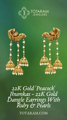 “Smile, it is the key that fits the lock of everybody's heart.” - Anthony J. D'Angelo |  Bring a smile to her face with these unique 22k gold “Peacock” Jhumkas designed with ruby & pearls. Find these and more 22k and 18k gold gemstone chandbalis, jhumkas and other traditional south Indian earring styles at Totaram.com. Gold 22k Chandbalis With Peacock Design, 22k Gold Peacock Design Earrings For Ceremonial, 22k Gold Peacock Design Earrings For Ceremonial Occasions, Gold Jhumkas With Peacock Design For Celebrations, Gold Chandbalis With Peacock Design In 22k Gold, Ceremonial 22k Gold Peacock Earrings, Traditional 22k Gold Jhumkas With Peacock Design, 22k Gold Temple Jewelry Jhumkas For Festive Occasions, 22k Gold Temple Jewelry Jhumkas With Peacock Design