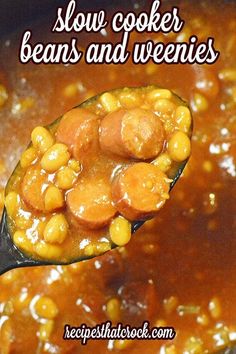 a spoon full of beans and veggies with the words slow cooker beans and weenies