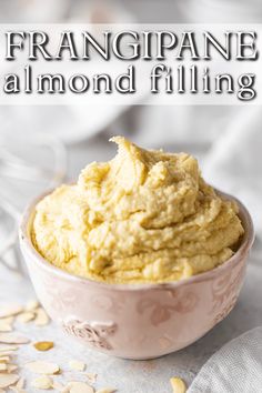 a bowl filled with almond filling on top of a table