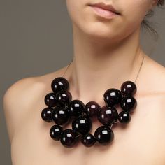 "This Black chunky necklace is made of glass in the lampwork technique, each bead is hand blown and unique. This Black bib beaded necklace is lightweight, stylish and elegant and will become a versatile and irreplaceable addition to your everyday outfits! 💕 You will definitely look stunning in this glass bubble necklace! Dimensions: the necklace length is adjustable, 16 1/2\"-19\" inch (42-48cm). Materials: artist lampwork glass beads, metal fittings. 🎁 This big bead necklace will also be a gr Black Glass Jewelry With Large Beads, Black Round Bead Bib Necklaces For Party, Unique Black Bib Necklace As A Gift, Modern Black Round Beads Necklace, Modern Black Necklace With Round Beads, Unique Black Beaded Necklace For Party, Black Glass Bead Necklace, Unique Handmade Black Bib Necklaces, Unique Handmade Black Bib Necklace