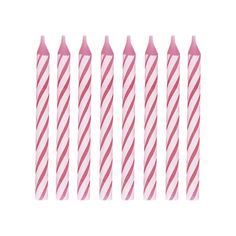 six pink and white striped candles are lined up