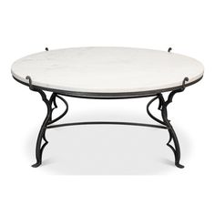 a white marble coffee table with wrought iron legs and an oval top, viewed from the front