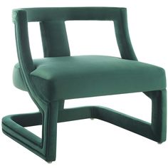 an upholstered green chair with curved arms