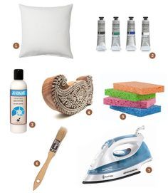 some items that are on top of a white table and in front of a pillow