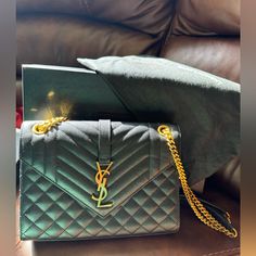 Gently Used But In Brand New Condition. Comes With Original Box, Dust Bag, Wrapping Paper,Cards, And Price Tag. Medium Sized, Black With Gold Hardware. No Stains Or Marks Inside Or Outside Of The Bag. Dior Montaigne, Yves Saint Laurent Bags, Envelope Bag, Luxury Products, Saint Laurent Bag, Diamond Quilt, Chain Bags, Chanel Handbags, Small Bag