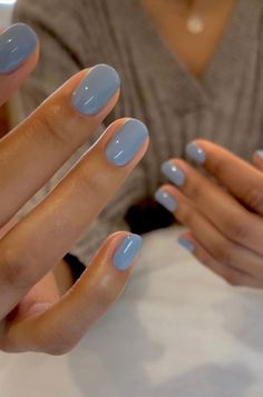 Embrace the softness of this pastel blue, reminiscent of a serene sky at dawn. It brings a whisper of calm, like a gentle breeze over a still lake. Nail Art Solid Color, Blue Nails Classy, Short Nails Jelly, Short Nails One Color, Clean Girl Nails Short, Solid Color Nails Summer, Summer Nails Light Blue, Blue Pastel Nails, Girl Nails Aesthetic