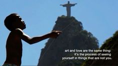 a young boy flying a kite in front of the christ statue with a quote about art and love are the same thing it's the process of seeing if you yourself in things that are not you