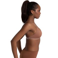 Say goodbye to noticeable bra straps! Designed to fit under leotards and costumes, this bra features a clear back strap that provides support in a discreet way. With a deep plunging neckline, this bra offers a secure, uplifting fit. Adult sizes come with removable cups. Both the clear and dyed-to-match bra straps adjust and transition between three back neckline positions for different looks and functional support. Clear Back, Bra Straps, Plunging Neckline, Back Strap, Leotards, Mocha, Bra