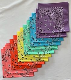 six different colored handkerchiefs with designs on them