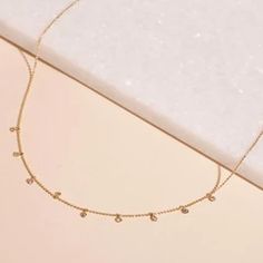 Teeny Dangling Diamond Bead Chain Necklace – STONE AND STRAND Stone And Strand, Bead Chain Necklace, Necklace Stone, Bead Chain, Beaded Chain, Stone Necklace, Diamond Jewelry, Gold Bracelet, Chain Necklace