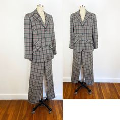 "1970's Pendleton pantsuit in dark green, white, red wool plaid tartan pant and matching jacket. The pants have back zipper and single button closure, semi elastic waist, pants are fully lined, straight semi wide leg. The jacket has classic blazer silhouette, pointed collar, long sleeve, darted bust, two button front and three hip pockets on one side and two on the other, fully lined. The Pendleton label dates the suit circa 1970. It is in perfect vintage condition, no flaws to note, dry clean o Fitted Skirt Suit For Career In Fall, Retro Notch Lapel Fall Suits, Retro Notch Lapel Suits For Fall, Fall Retro Suits With Notch Lapel, Retro Fall Suits For Tailoring, Retro Tailored Suit For Fall, Tailored Retro Suits For Workwear, Retro Fall Skirt Suit For Formal Occasions, Retro Long Sleeve Skirt Suit For Work