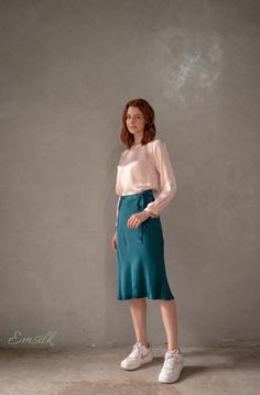 "This luxury exclusive design silk skirt is perfect for fall and winter. 100 % designed and handmade by Emsilk. I am pleased to offer your garments made to measure at no extra cost. All of my designs can be made in any colors that you see in my shop. Link to all colors in pure silk: https://www.etsy.com/shop/emsilkdesign?ref=seller-platform-mcnav&section_id=28483599 * Detail: - Slip skirts go with any tops and beautiful all year around. - Midi skirt - bow tied straps - Below the knee/ or len Flowy Silk Midi Skirt, Elegant Silk Wrap Skirt For Spring, Silk Relaxed Flared Skirt, Silk Skirt For Workwear In Fall, Relaxed Silk Flared Skirt, Chic Silk Pencil Skirt For Spring, Silk Workwear Skirt For Fall, Relaxed Fit Silk Flared Skirt, Fall Silk Skirt For Work