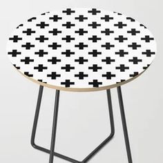 a black and white table with crosses on it