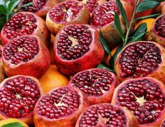 there are many pomegranates on the table