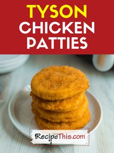 three fried food items on a plate next to a coffee pot and saucer in the background