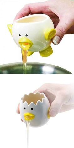 a person pouring liquid into a cup with a duck on it and another hand holding an egg