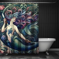 a shower curtain with a mermaid holding a knife in it's hand and an ocean themed background