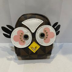 New! Super Cute Owl Backpack Purse Charm/Change Holder! This Measures 3.5 Inches Tall & 3 1/4 Inches Across. Has A Zipper Top That Opens Up And Can Fit Compact Gloss Stick, A Credit Card Or A Few Dollars, Or Just Change. I Was Surprised How Much Stuff I Could Fit Inside. I Carry Around Lens Drops And Fit The Travel Bottle Inside! Love The Little Face And The Print. I Have These In The White, Brown And Pink. Fell In Love With The Design So I Purchased A Ton To Give To My Friends. Can Be Used As A Cute Brown Bag With Adjustable Strap, Cute Brown Travel Backpack, Cute Portable Brown Bag, Cute Brown Mobile Phone Bag, Cheap Cute Coin Purse With Cat Design, Givenchy Bag Pandora, Owl Purses Handbags, Crochet Owl Purse, Pandora Bag