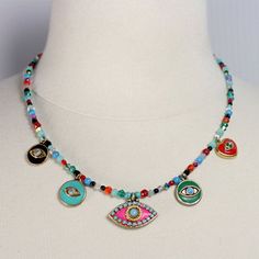 Rainbow Evil Eye Charm Choker Necklace / Colorful Evil Eyes on | Etsy Adjustable Multicolor Charm Necklaces With Colorful Beads, Multicolor Pendant Necklace For The Beach, Multicolor Round Evil Eye Jewelry, Amulet Style Turquoise Necklace With Colorful Beads, Multicolor Pendant Jewelry For Beach, Colorful Round Beaded Jewelry, Vibrant Rainbow Jewelry With Colorful Design, Multicolor Evil Eye Jewelry, Multicolor Spacer Beads Jewelry For Festivals