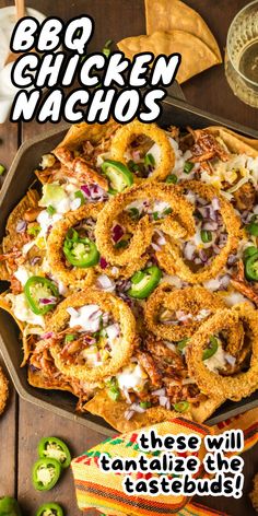 the bbq chicken nachos are ready to be eaten with green peppers and jalapenos