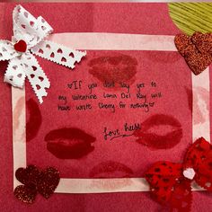 valentine's day card with handwritten poem and hearts on red paper sheeting