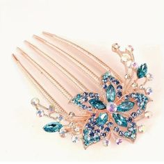 Beautiful Floral Hair Comb In Gold With Blue And Iridescent Crystals And Rhinestones. Measures Appr. 3.5" X 2.5". New To Poshmark? Use Code Emmiesbling For $10 Off Your Purchase When You Open A New Account. Check Out My Other Listings If You Like Boho Hippie 60’s 70’s 80’s 90’s Y2k Retro Mcm Pin-Up Beach Western Pool Coachella Festival Southwestern Bohemian Vintage Ig Instagram Tik Tok Gypsy Spell Vici Nasty Gal, Misguided, House Of Cb, Quay, Windsor, Lulus, H&M, Forever 21, Free People, , Booho Bride Hair Pins, Crystal Bridal Headpiece, Hair Comb Clips, Tiaras Jewellery, Rhinestone Hair Comb, Floral Hair Clip, Rhinestone Hair Pin, Vintage Hair Accessories, Bridal Hair Clip