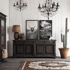 a living room filled with furniture and pictures on the wall next to a chandelier