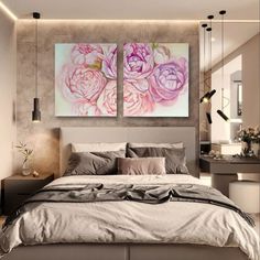 a bedroom with two paintings on the wall