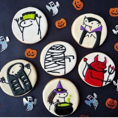 decorated cookies are arranged in the shape of halloween characters