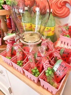 there are many items on the counter in this room that is decorated with watermelon