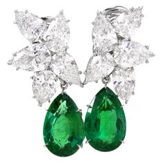 You too can walk the Red Carpet! These Extraordinary Diamond and Emerald earrings were handcrafted in Luxurious Platinum and inspired by a floral motif extremely similar in style to those worn by Jennifer Lopez on the Red Carpet in 2019 that Alex Rodriguez had gifted her for Christmas. Two Genuine Pear shaped vibrant emeralds (detachable) dangle freely weighing approx: 6.97carats and 7.07 carats, totaling 14.04 carats. Both are GIA graded to be a natural beryl. The Emerald drops measure 16.66 x 10.84 x 6.77mm, and 16.72mm X 10.71mm X 6.56mm. Total 10 diamonds weight is 14.64 carats. Diamond weight ranges from 1.82 carat to 1.16 carats. each individually comes with GIA Lab Report. All color are D, E, and F color, and the clarity are two VVS1, one VVS2 clarity, two VS1, one VS2, three SI1, a Alex Rodriguez, Luxury Earrings, Jewelry Appraisal, Diamond Dangle Earrings, Expensive Jewelry, Emerald Earrings, Antique Diamond, On The Red Carpet, Lovely Jewellery