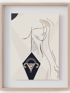 an abstract painting with lines and shapes in a wooden frame on a white wall next to a black geometric design