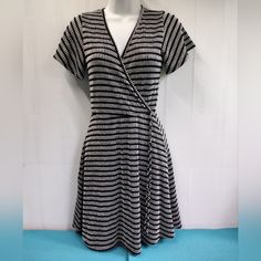 Caution To The Wind Women's Sun Dress Striped A-Line Black/White Stretch - Size S - Nwot Fitted Black And White Casual Dress, Casual Fitted Black And White Dress, Black And White Striped Dress, Black And White A-line Summer Dress, Black And White Striped Victorian Dress, Black And White Stripe 50s Dress, Vertical Striped Dress Black And White, Beach Dresses With Vertical Stripes And V-neck, Sundresses Women